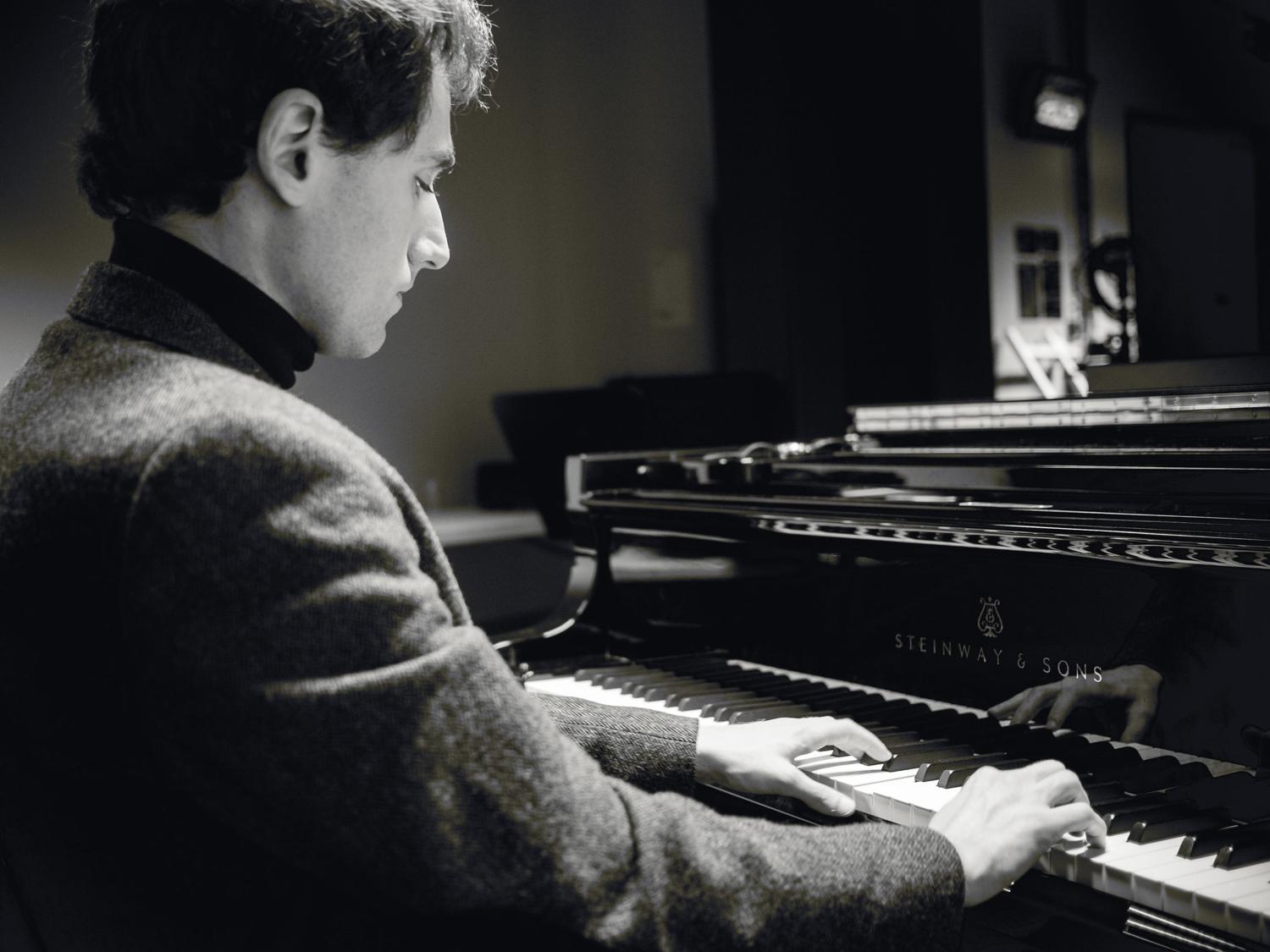 Boris Giltburg at a grand piano